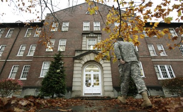 A military court building on Joint Base Lewis-McChord is shown Tuesday,  in Washington state. An Article 32 hearing for Staff Sgt. Calvin Gibbs began on charges that include murder, dereliction of duty and trying to impede an investigation, in connection with the deaths of Afghan civilians while Gibbs was deployed in Afghanistan. 